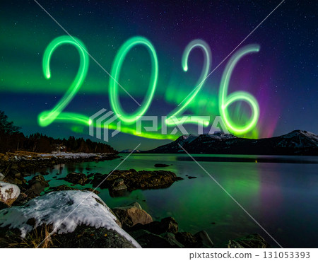 a scenic natural landscape at night with a body of water in the foreground, surrounded by rocky. a scenic natural landscape at night with a body of water in the foreground, surrounded by rocky. 131053393
