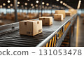 Close-up of cardboard boxes moving down a conveyor 131053478