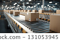The power of logistics: A close-up of cardboard boxes being transported on a conveyor belt 131053945