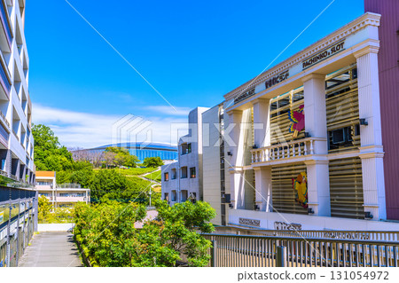 Yokohama cityscape in September. View of Kitayamada Station on the Yokohama Municipal Subway Green Line. Yokohama International Pool in the background on the left. 131054972