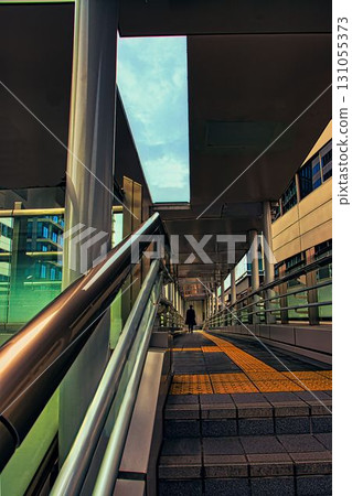 Pedestrians walking on the skywalk 131055373