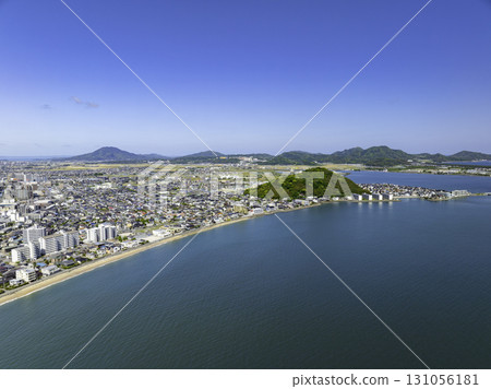 Drone aerial shot of Imajuku, Maebara, and Kyushu University Research City taken from offshore Nagataru Coast, Fukuoka 131056181