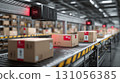 Cardboard boxes undergoing automatic barcode scanning on a conveyor line in a logistics warehouse 131056385