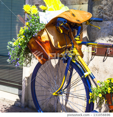 charming streets of italy.Floral bicycle decor, artistic vintage picture charming streets of italy.Floral bicycle decor, artistic vintage picture 131056696