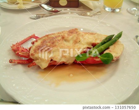 The main dish at the hotel restaurant: a plate of spiny lobster gratin The main dish at the hotel restaurant: a plate of spiny lobster gratin 131057650