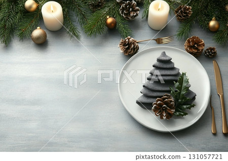 Christmas table setting with festive decor, flat lay. Space for text 131057721