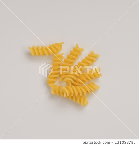 Dry fusilli pasta on white background top view 131058783