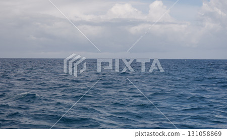 Side view from boat in Indian ocean sailing between Seychelles islands in daytime 131058869
