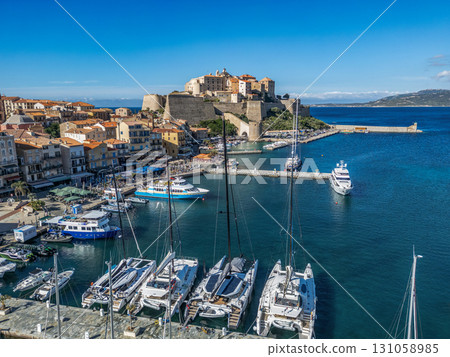 Aerial view Citadel of Calvi Upper Corsica French maritime stronghold in the Mediterranean Sea with defensive walls Aerial view Citadel of Calvi Upper Corsica French maritime stronghold in the Mediterranean Sea with defensive walls 131058985