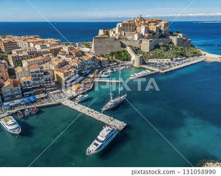Aerial view Citadel of Calvi Upper Corsica French maritime stronghold in the Mediterranean Sea with defensive walls Aerial view Citadel of Calvi Upper Corsica French maritime stronghold in the Mediterranean Sea with defensive walls 131058990