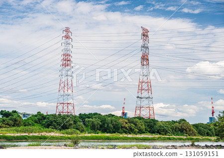 Power line tower standing on the banks of the Yodo River, Takatsuki City, Osaka Prefecture 131059151