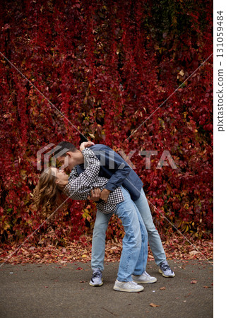 Young Cute Female Hugs Boyfriend. In Autumn Outdoor. Lovers Walking in Park. Attractive Funny Couple. Lovestory in Forest. Man and Woman. Cute Lovers in the Park. Family Concept. Happy Couple. Young Cute Female Hugs Boyfriend. In Autumn Outdoor. Lovers Walking in Park. Attractive Funny Couple. Lovestory in Forest. Man and Woman. Cute Lovers in the Park. Family Concept. Happy Couple. 131059484
