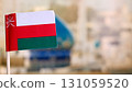 Oman flag selective focus with copy space 131059520