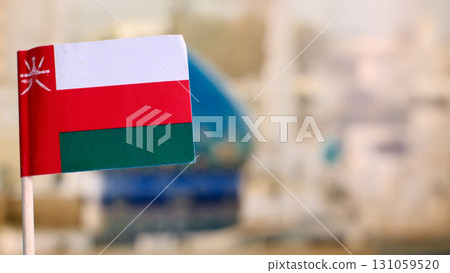 Oman flag selective focus with copy space 131059520