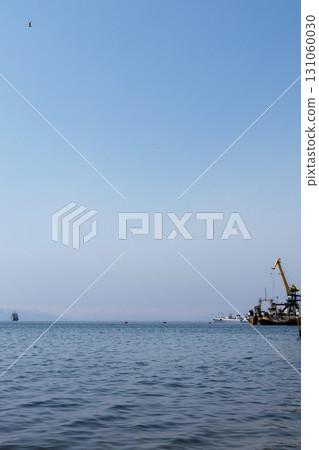 crane and ship in bay in Petropavlovsk-Kamchatsky crane and ship in bay in Petropavlovsk-Kamchatsky 131060030