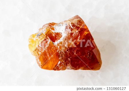 sample of raw scheelite mineral on white marble sample of raw scheelite mineral on white marble 131060127
