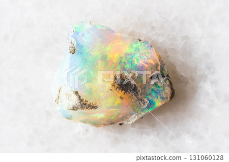 sample of rough ethiopian opal mineral on white sample of rough ethiopian opal mineral on white 131060128