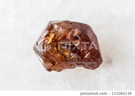 sample of rough hyacinth zircon crystal on white sample of rough hyacinth zircon crystal on white 131060136