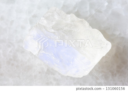 rough adularia moonstone mineral on white marble rough adularia moonstone mineral on white marble 131060156