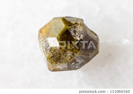 sample of rough grossular garnet crystal on white 131060160