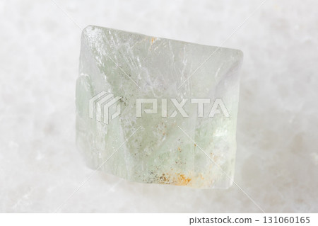 sample of single rough fluorite crystal on white 131060165