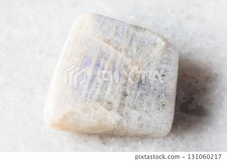 polished belomorite moonstone mineral on white 131060217