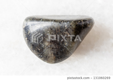 sample of polished diorite rock on white marble sample of polished diorite rock on white marble 131060269