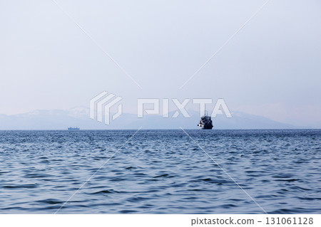 ship in Avacha bay in blue spring evening twilight 131061128