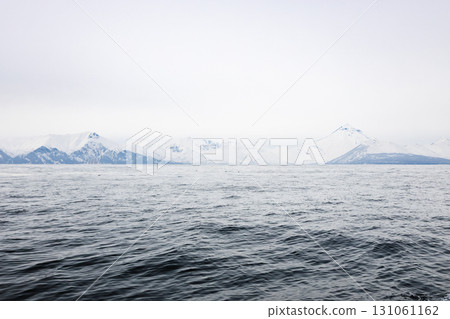 water and snowy coast of Pacific ocean, Avacha bay water and snowy coast of Pacific ocean, Avacha bay 131061162