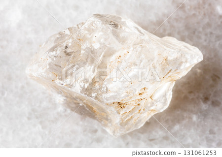 sample of rough rock crystal mineral on white 131061253
