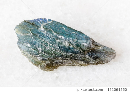 sample of raw green labradorite mineral on white sample of raw green labradorite mineral on white 131061260