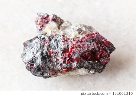 cinnabar and stibnite on fluorite mineral on white cinnabar and stibnite on fluorite mineral on white 131061310