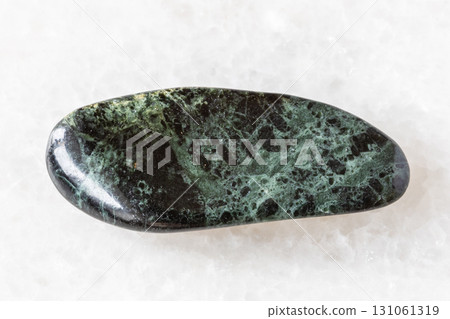 polished peridotitic komatiite rock on white polished peridotitic komatiite rock on white 131061319