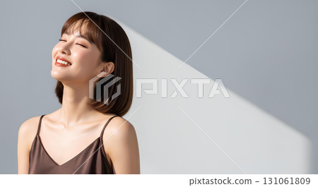 Natural light portrait of a stylish bob haircut model woman 131061809