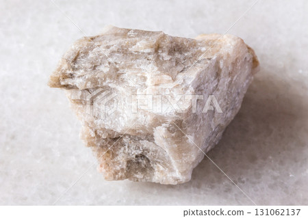 sample of raw oligoclase rock on white marble sample of raw oligoclase rock on white marble 131062137