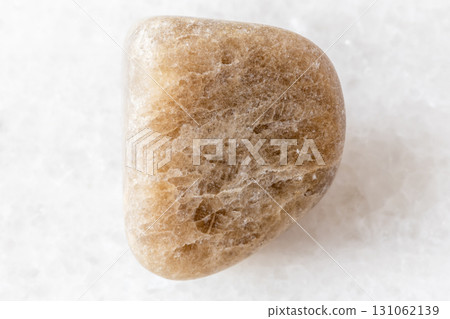 sample of polished cryolite rock on white sample of polished cryolite rock on white 131062139