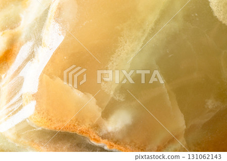polished surface of calcite onyx rock close up 131062143