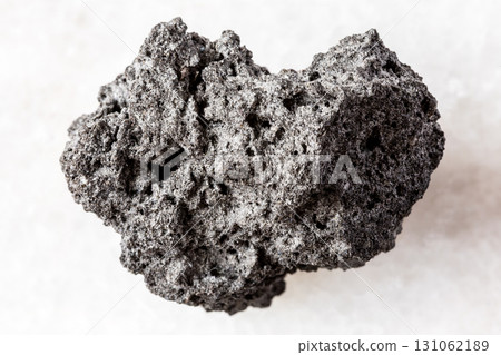 sample of rough pumice mineral on white marble sample of rough pumice mineral on white marble 131062189