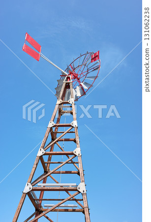 An old windpump against the blue sky. An old windpump against the blue sky. 131062238