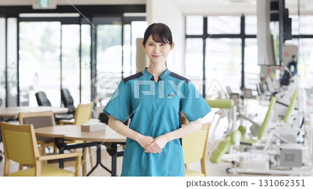 Asian caregiver working in a care facility 131062351