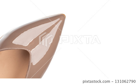 Close-up of nude patent leather heel tip Close-up of nude patent leather heel tip 131062790