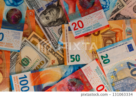 Multicurrency background of US dollars, euros and Swiss francs 131063334
