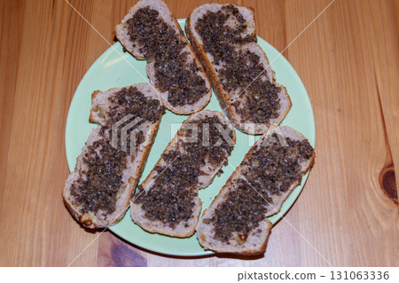 Sandwiches with truffle sauce on wooden table 131063336