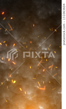 Flying sparks and glowing embers rising against smoky dark background, symbolizing fire and heat 131063604