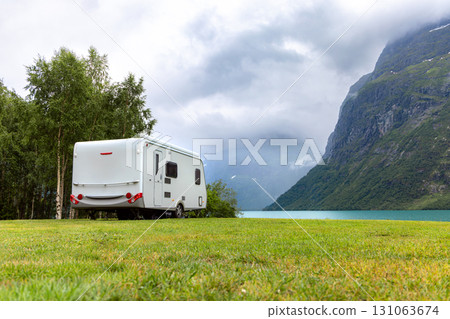 Family vacation travel RV, holiday trip in motorhome, Caravan car Vacation. Beautiful Nature Norway. Family vacation travel RV, holiday trip in motorhome, Caravan car Vacation. Beautiful Nature Norway. 131063674