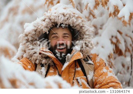 portrait of a man enjoying snow and winter portrait of a man enjoying snow and winter 131064374