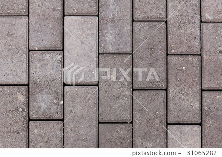 Close-Up Aerial View of Decorative Paving Stones, Showcasing Unique Patterns and Textures for Urban Landscaping and Outdoor Design Close-Up Aerial View of Decorative Paving Stones, Showcasing Unique Patterns and Textures for Urban Landscaping and Outdoor Design 131065282