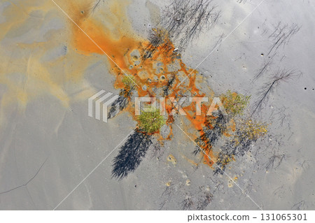 Aerial view of a big waste decanting lake, tailing pond. Mining residual waters discharged from copper mine Aerial view of a big waste decanting lake, tailing pond. Mining residual waters discharged from copper mine 131065301
