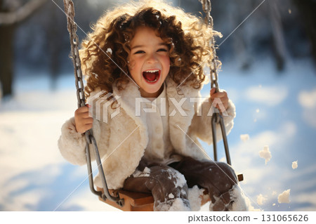 portrait of a child girl enjoying snow and winter portrait of a child girl enjoying snow and winter 131065626