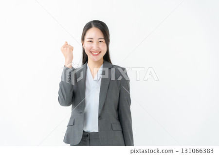 Business woman suit guts pose Business woman suit guts pose 131066383